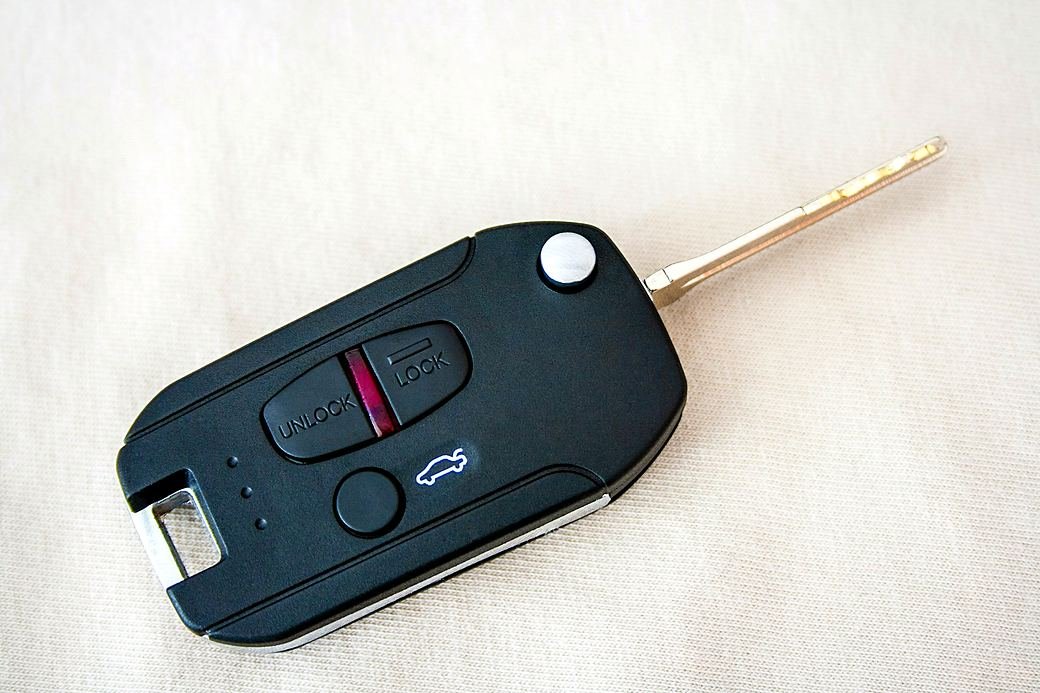 A flip car key with the cut blade extended